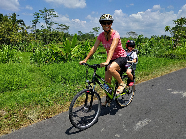 Clare and Casper cycling in Bali, Indonesia